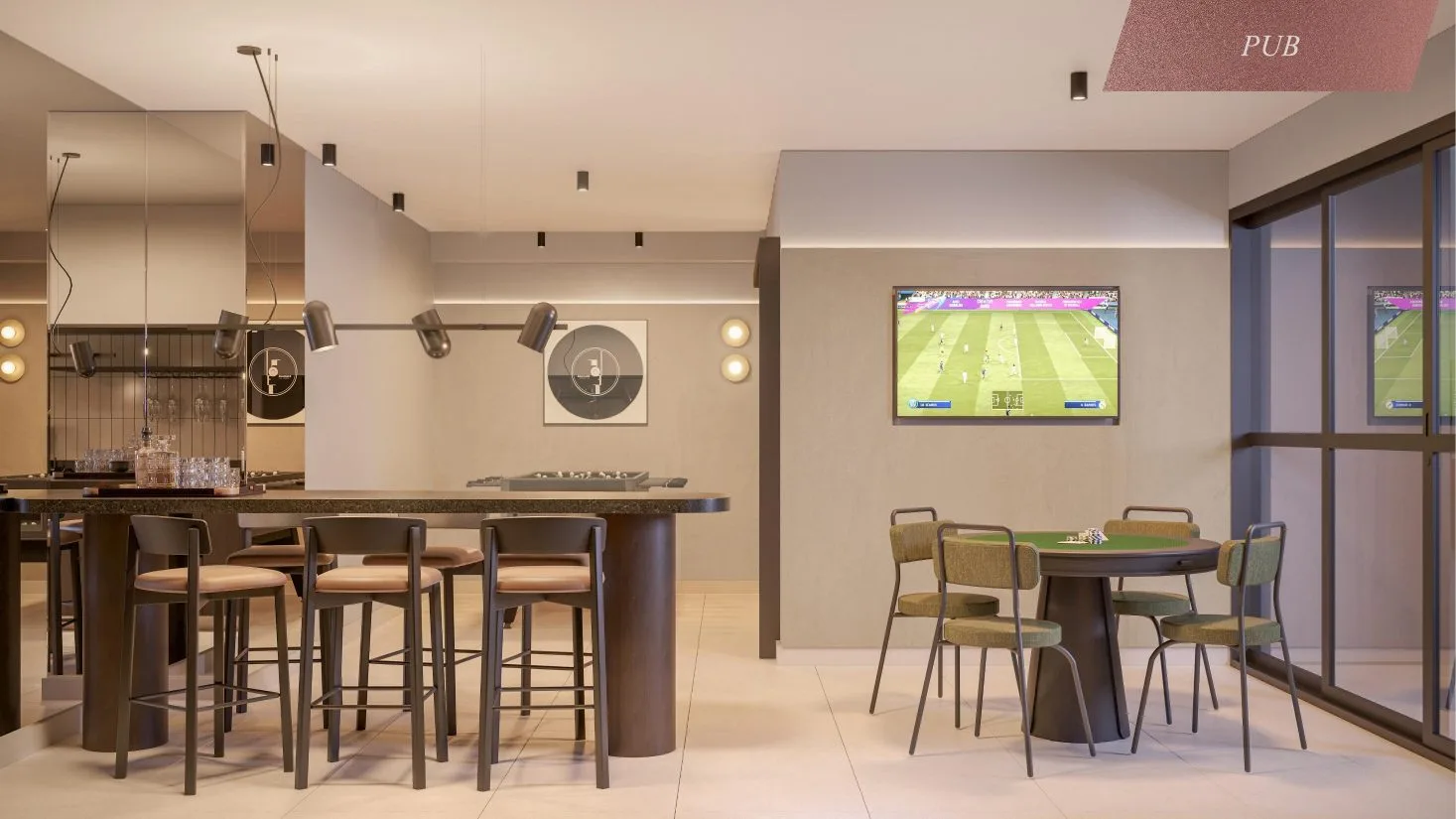 Pub do Casa Sigaud, com bar, mesas e televisão